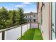A charming balcony with artificial grass and frosted glass railings gives a modern feel at 204 Wilbur Se Ave, Atlanta, GA 30316