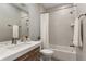 Modern bathroom with a sleek vanity, updated fixtures, and a shower with a shower-tub combo at 204 Wilbur Se Ave, Atlanta, GA 30316
