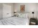Comfortable bedroom showcasing a cozy bed, side tables, and a double-door closet at 204 Wilbur Se Ave, Atlanta, GA 30316