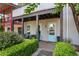 Inviting front porch with a table and chairs, providing a charming outdoor seating area at 204 Wilbur Se Ave, Atlanta, GA 30316