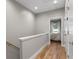 Hallway with wood floors and access to a bedroom at 204 Wilbur Se Ave, Atlanta, GA 30316