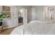 A spacious bedroom features an open bathroom entrance and light-filled interiors at 204 Wilbur Se Ave, Atlanta, GA 30316