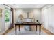 Spacious home office with hardwood floors, lots of lighting, and a door leading to the outside at 204 Wilbur Se Ave, Atlanta, GA 30316