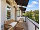Outdoor patio area with wood furniture and awning covering at 204 Wilbur Se Ave, Atlanta, GA 30316