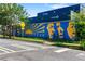 Street view of Reynoldstown with painted murals on blue shipping containers at 204 Wilbur Se Ave, Atlanta, GA 30316