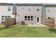 Backyard featuring a patio and well-maintained lawn, perfect for relaxation at 323 Hayden Circle Cir, Woodstock, GA 30189