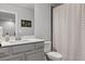 Neutral bathroom featuring gray vanity and shower-tub combo at 323 Hayden Circle Cir, Woodstock, GA 30189