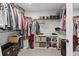 Walk-in closet boasts ample storage with shelving and hanging racks at 323 Hayden Circle Cir, Woodstock, GA 30189