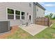 Outdoor patio with chairs, surrounded by lush green lawn at 323 Hayden Circle Cir, Woodstock, GA 30189