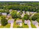 This is an aerial view of the neighborhood showing lush, mature trees and well-maintained lawns at 4255 Brandy Ann Dr, Acworth, GA 30101