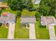This is an aerial view of the home and yard featuring mature trees and an expansive lawn at 4255 Brandy Ann Dr, Acworth, GA 30101