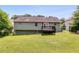 Exterior back of home with green lawn at 4255 Brandy Ann Dr, Acworth, GA 30101