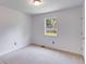 Bright bedroom with neutral carpet, ample natural light from the window, and closet at 4255 Brandy Ann Dr, Acworth, GA 30101