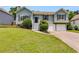 Charming split-level home features a well-manicured lawn, a two-car garage, and inviting curb appeal at 4255 Brandy Ann Dr, Acworth, GA 30101