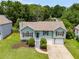Charming split-level home featuring a manicured lawn, a two-car garage, and inviting curb appeal at 4255 Brandy Ann Dr, Acworth, GA 30101