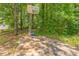 Backyard features a sport court perfect for outdoor activities and entertainment at 4945 Penscot Way, Stone Mountain, GA 30088