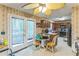 Kitchen featuring wood cabinets, appliances, and an eat-in area at 4945 Penscot Way, Stone Mountain, GA 30088