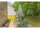 Outdoor patio featuring a table with chairs, great for entertaining and relaxing in the backyard at 4945 Penscot Way, Stone Mountain, GA 30088