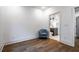 Bedroom with hardwood floors and access to the bathroom at 77 Krog Ne St, Atlanta, GA 30307