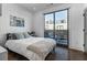 Bedroom with access to an outdoor terrace area and features a modern interior at 77 Krog Ne St, Atlanta, GA 30307
