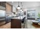 Spacious kitchen with a large island, stainless appliances, and modern lighting at 77 Krog Ne St, Atlanta, GA 30307