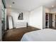 Stylish main bedroom featuring wood floors, a mirror, and a closet at 77 Krog Ne St, Atlanta, GA 30307
