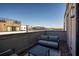 Rooftop patio with comfortable seating and views of the city skyline at 77 Krog Ne St, Atlanta, GA 30307