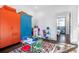 Playroom featuring colorful closets, a table with seating, and light from a door to an outdoor space at 77 Krog Ne St, Atlanta, GA 30307