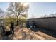 A spacious rooftop with an HVAC system and a leafy tree in the background at 77 Krog Ne St, Atlanta, GA 30307