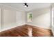Bedroom with hardwood floors, a ceiling fan, and ample natural light at 1098 Cascade Sw Cir, Atlanta, GA 30311