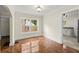 Dining area featuring parquet floors, natural light, and access to the kitchen at 1098 Cascade Sw Cir, Atlanta, GA 30311
