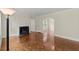 Bright living room showcasing parquet floors, fireplace, and abundant natural light at 1098 Cascade Sw Cir, Atlanta, GA 30311