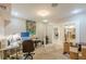Basement office area with neutral walls, carpet, and glass paneled doors to another room at 118 Surge Stone Ln, Stockbridge, GA 30281