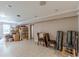 Spacious basement with neutral walls and flooring, lit by recessed lighting and a window at 118 Surge Stone Ln, Stockbridge, GA 30281