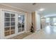 Basement with neutral walls, carpet, and glass paneled doors to another room at 118 Surge Stone Ln, Stockbridge, GA 30281