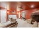 Unfinished basement with theater seating, a projector, and ample space at 118 Surge Stone Ln, Stockbridge, GA 30281