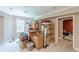 Spacious open basement with tile and neutral walls with a window for natural light at 118 Surge Stone Ln, Stockbridge, GA 30281