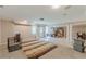 Open basement with tile and carpet, natural light, neutral walls, and ample space at 118 Surge Stone Ln, Stockbridge, GA 30281