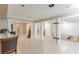 Spacious finished basement with columns, tile flooring, and natural light at 118 Surge Stone Ln, Stockbridge, GA 30281