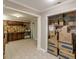 Bright basement with a utility sink, lots of cabinet space, and a storage area at 118 Surge Stone Ln, Stockbridge, GA 30281