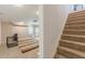 Spacious carpeted basement with stairs, windows, and walkout access at 118 Surge Stone Ln, Stockbridge, GA 30281