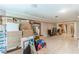 Spacious open basement with tile and carpet offers ample storage with natural lighting at 118 Surge Stone Ln, Stockbridge, GA 30281