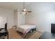 Bedroom featuring a ceiling fan, neutral carpet, and vaulted ceiling at 118 Surge Stone Ln, Stockbridge, GA 30281