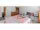 Bedroom featuring a ceiling fan, neutral carpet, and vaulted ceiling at 118 Surge Stone Ln, Stockbridge, GA 30281