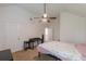 Bedroom featuring a ceiling fan, neutral carpet, and vaulted ceiling at 118 Surge Stone Ln, Stockbridge, GA 30281
