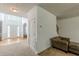Bright entryway with hardwood floors, a high ceiling, and staircase at 118 Surge Stone Ln, Stockbridge, GA 30281