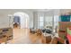 Bright living room with hardwood floors and large windows at 118 Surge Stone Ln, Stockbridge, GA 30281
