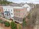Aerial view of multi-story home with well-maintained lawns and landscaping at 2026 Forte Lane, Alpharetta, GA 30009
