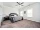 This bedroom is filled with light and features carpeted floors and classic shutters at 2026 Forte Lane, Alpharetta, GA 30009