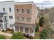 Beautiful brick building featuring a covered front porch and manicured landscaping at 2026 Forte Lane, Alpharetta, GA 30009